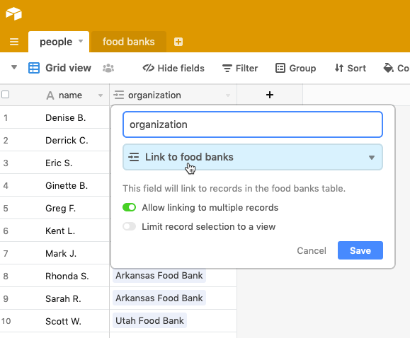 In this Airtable sample, we linked the organization column in the people sheet to the food banks sheet.